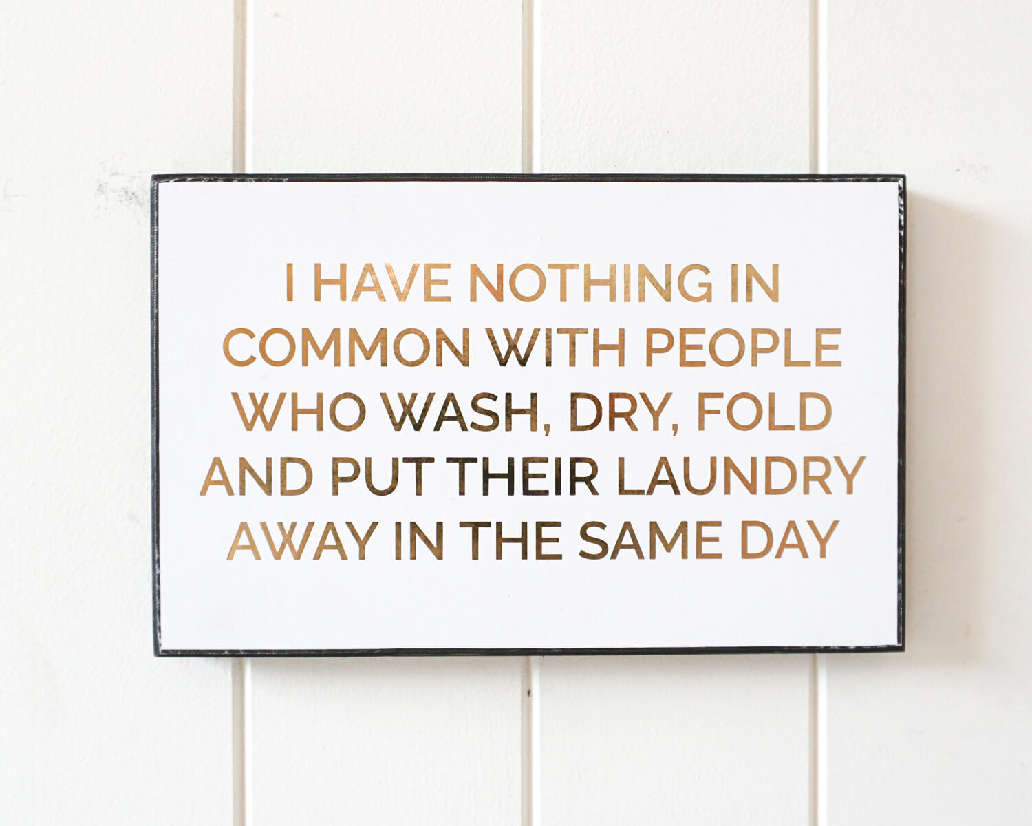'Laundry - Nothing in Common' Sign